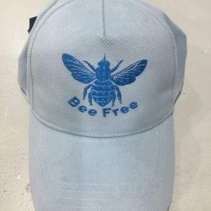 Blue cap with bee embroidery, 'Bee Free' text.